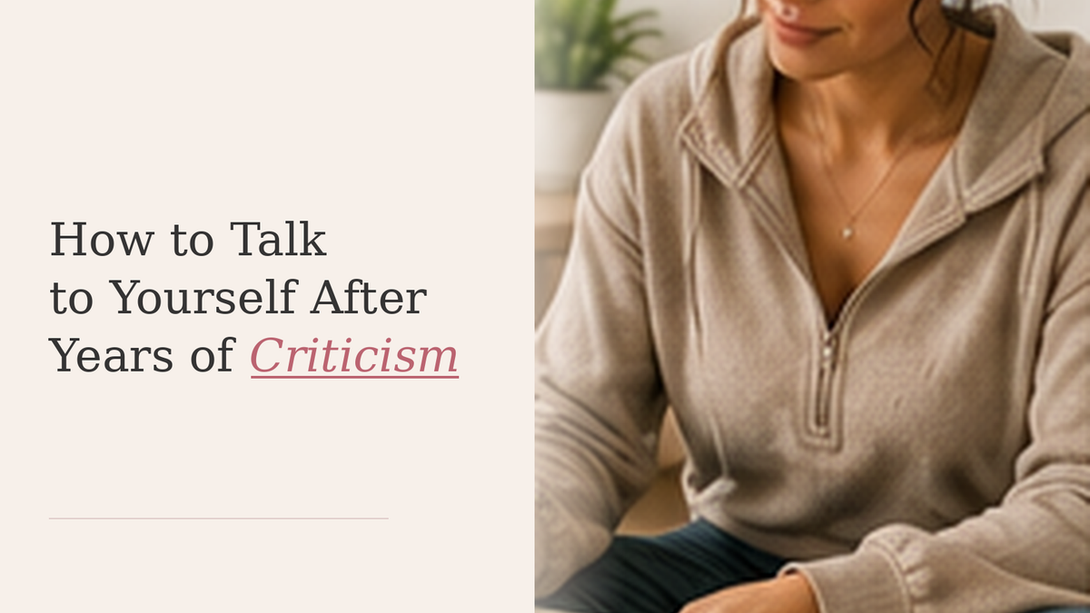 A woman reflects with warmth and seriousness, representing learning a kinder inner voice after years of criticism.
